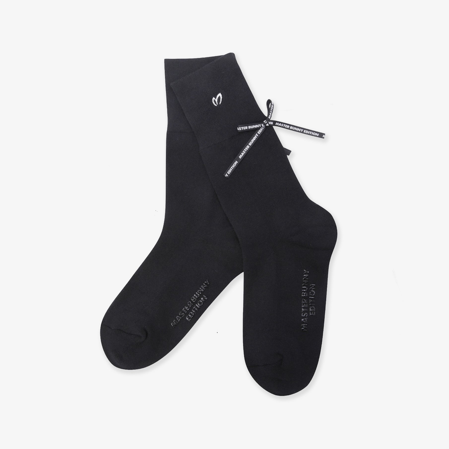 Black socks with brand logo on a white background