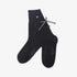 Black socks with brand logo on a white background