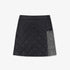 Black quilted skirt with gray accents on a white background