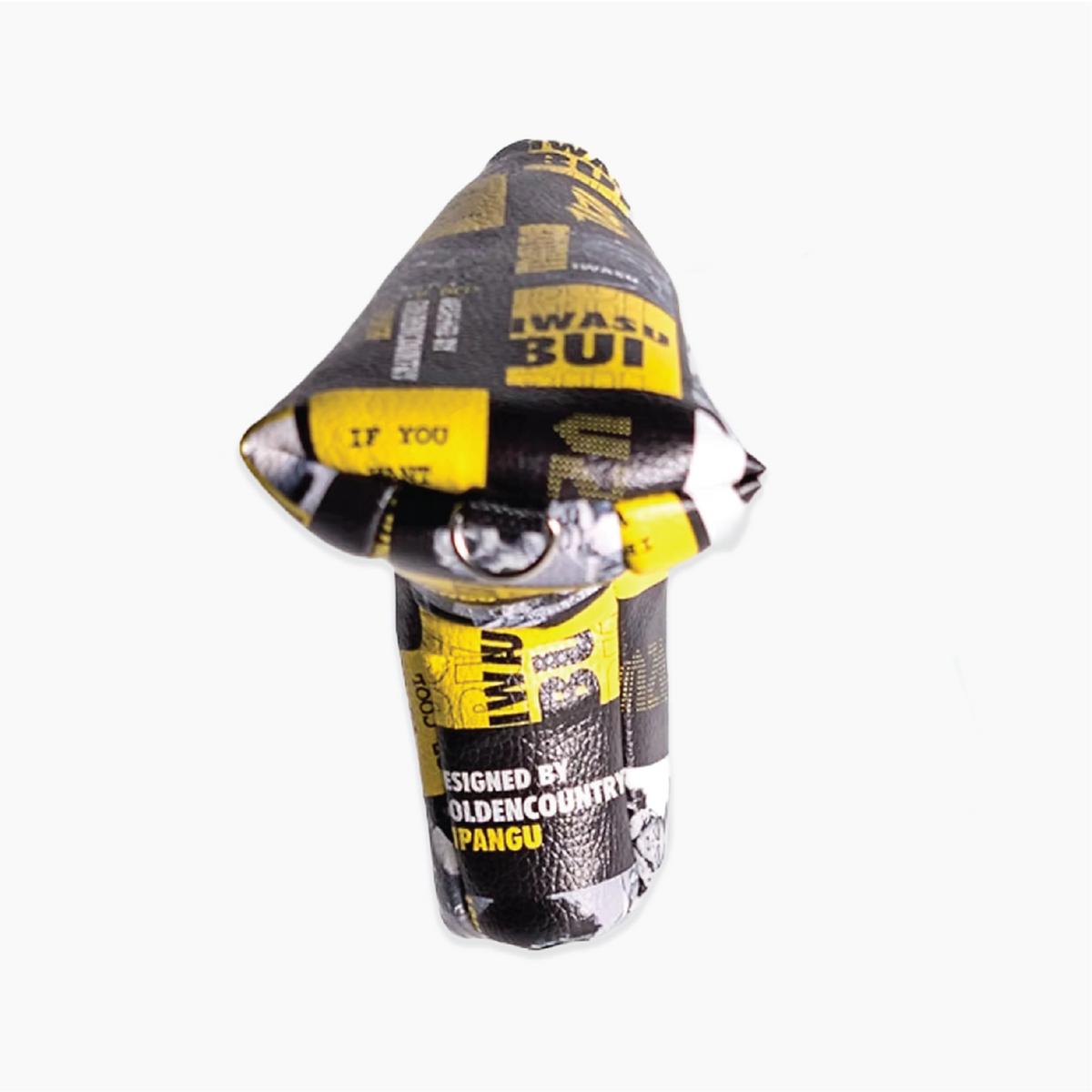 A novelty mushroom-shaped putter cover made from a printed black and yellow coffee bag, isolated on a white background.