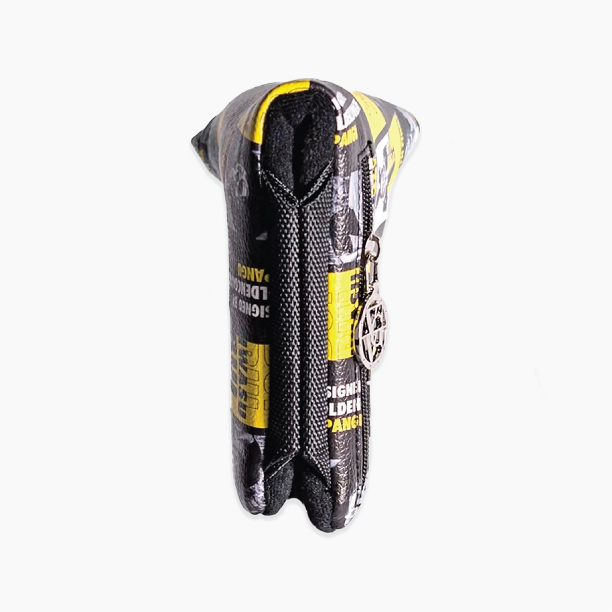 A golf club headcover in a black and yellow color scheme, featuring a textured pattern with text and a silver metal keyhole charm, shown against a plain white background.