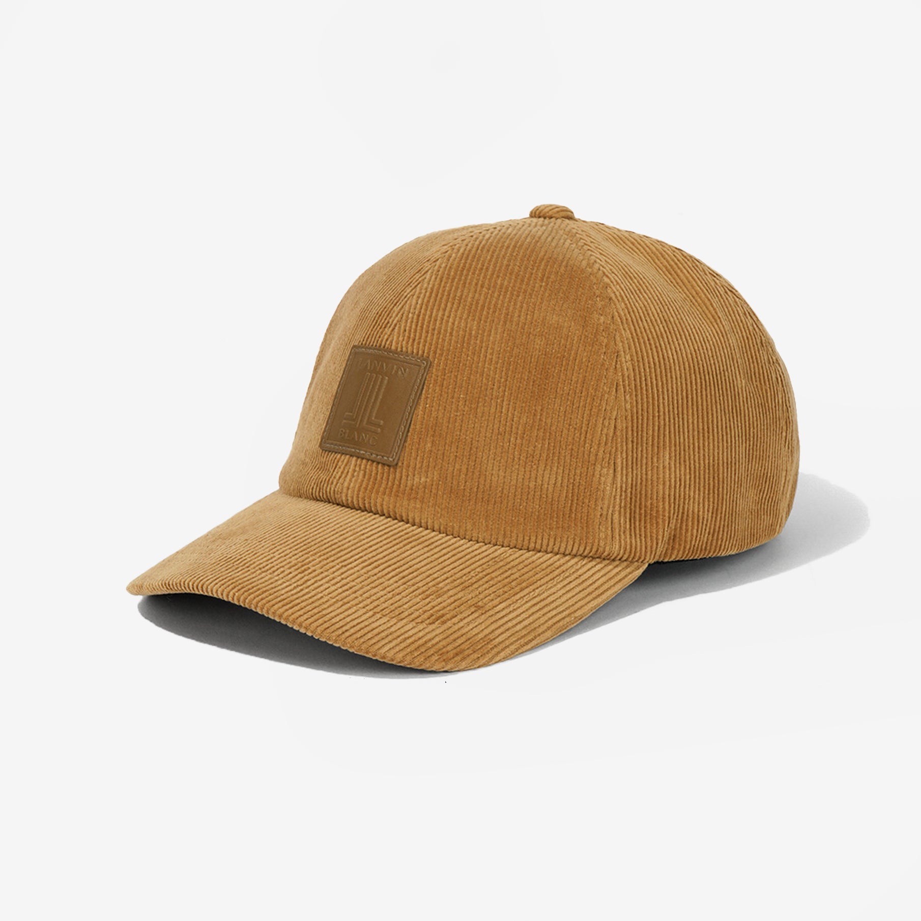 Brown corduroy cap on a light gray background