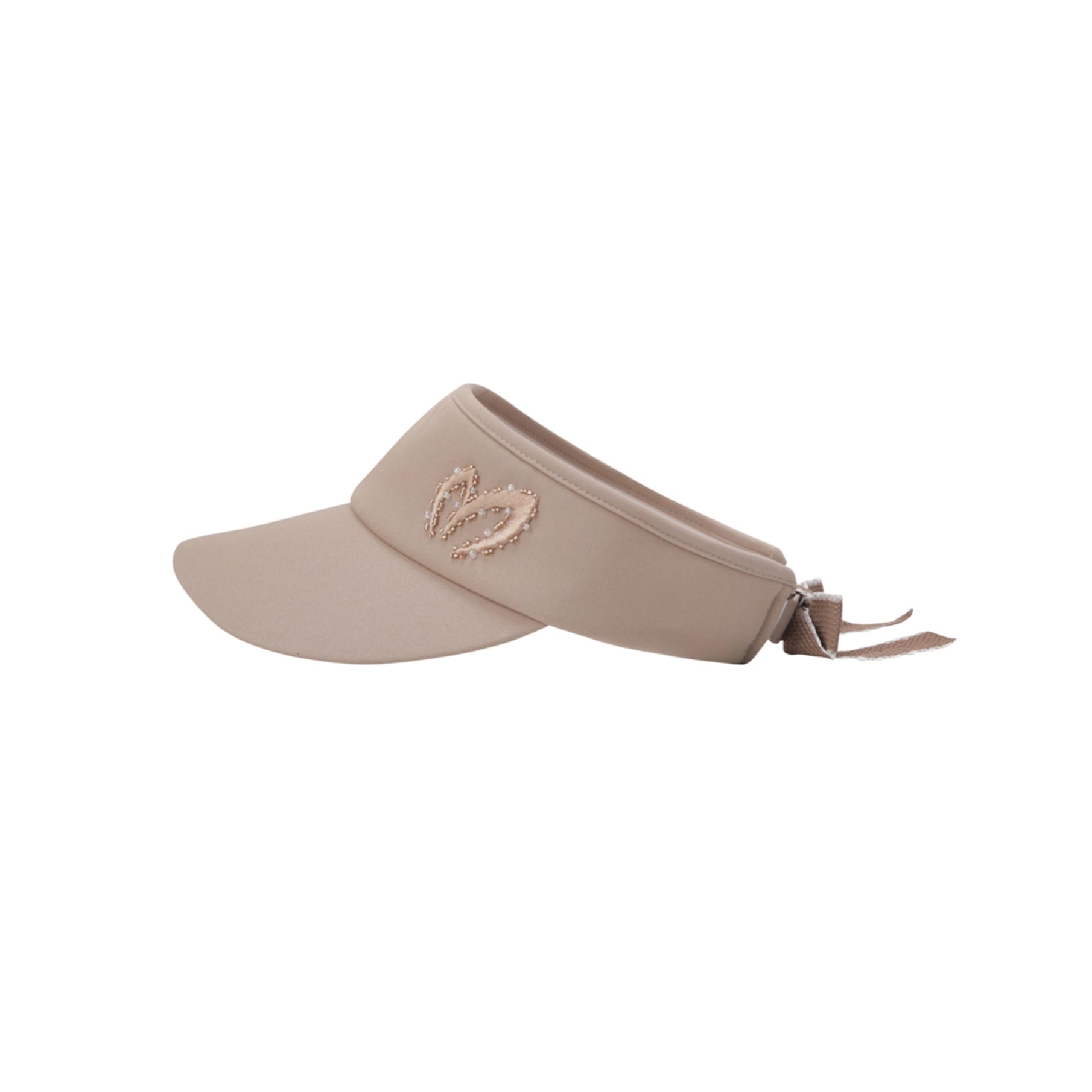 Beige visor cap with a decorative emblem on a white background
