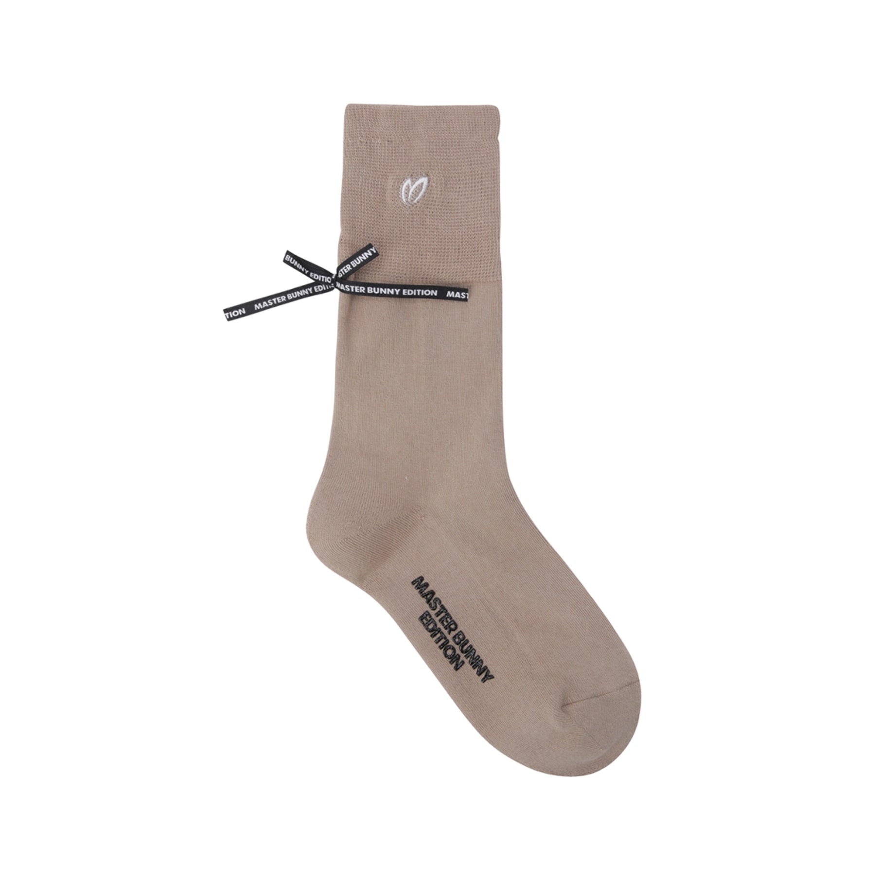 Beige sock with black branding on a white background