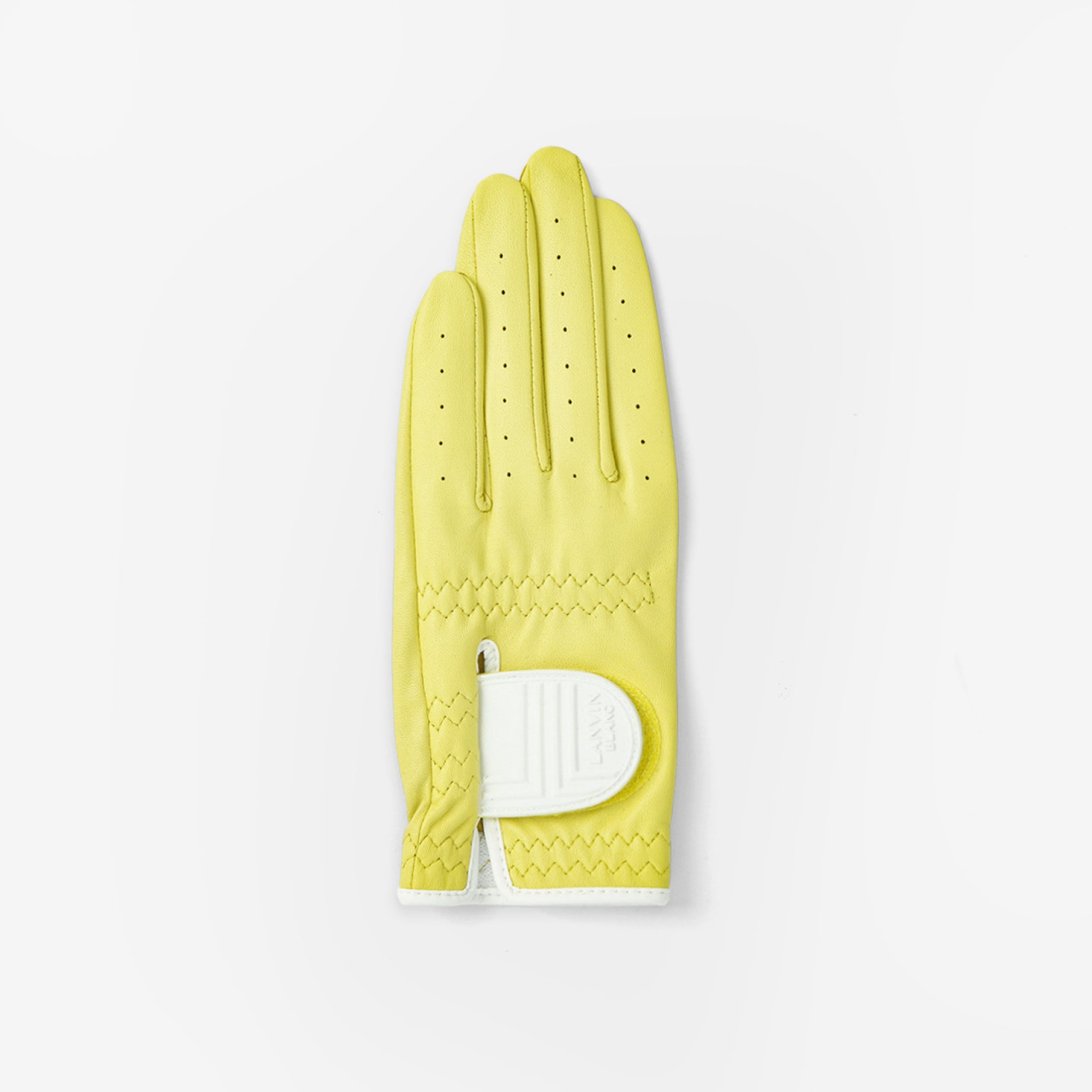 Yellow golf glove with a white patch on a light gray background