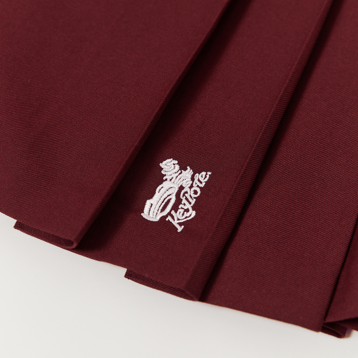 Keypote Women's Pleated Skort - Burgundy - Erthe Golf