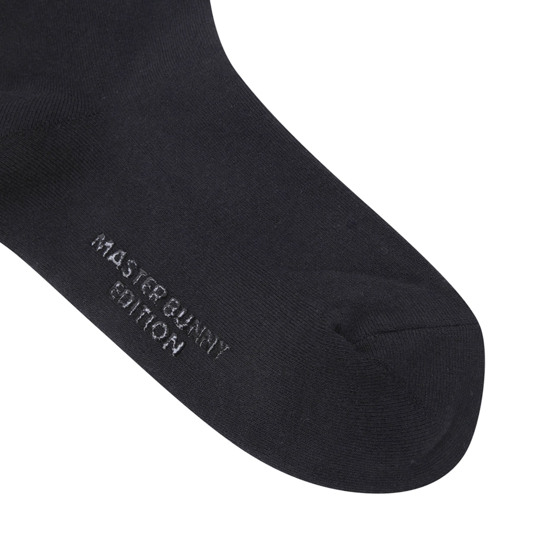 Black sock with 'Master Bunny Edition' text on a white background