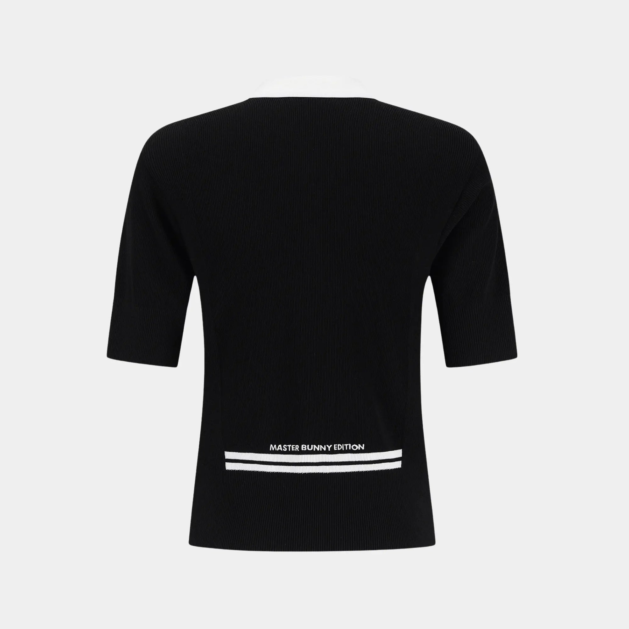 Black short-sleeve t-shirt shown from the back, featuring a white printed graphic with the text 'MASTER BUNNY EDITION' and two horizontal white stripes near the bottom hem, set against a light gray background.