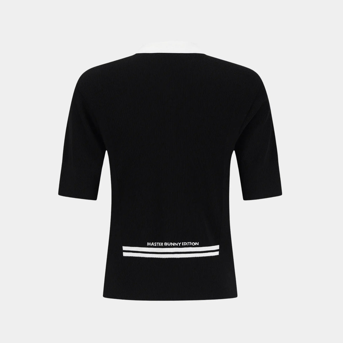 Black short-sleeve t-shirt shown from the back, featuring a white printed graphic with the text 'MASTER BUNNY EDITION' and two horizontal white stripes near the bottom hem, set against a light gray background.