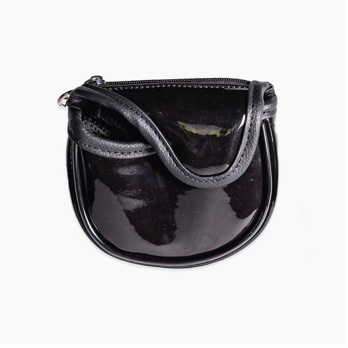 A small glossy black patent leather pouch bag with a curved top handle and a zipper closure, shown against a plain white background.