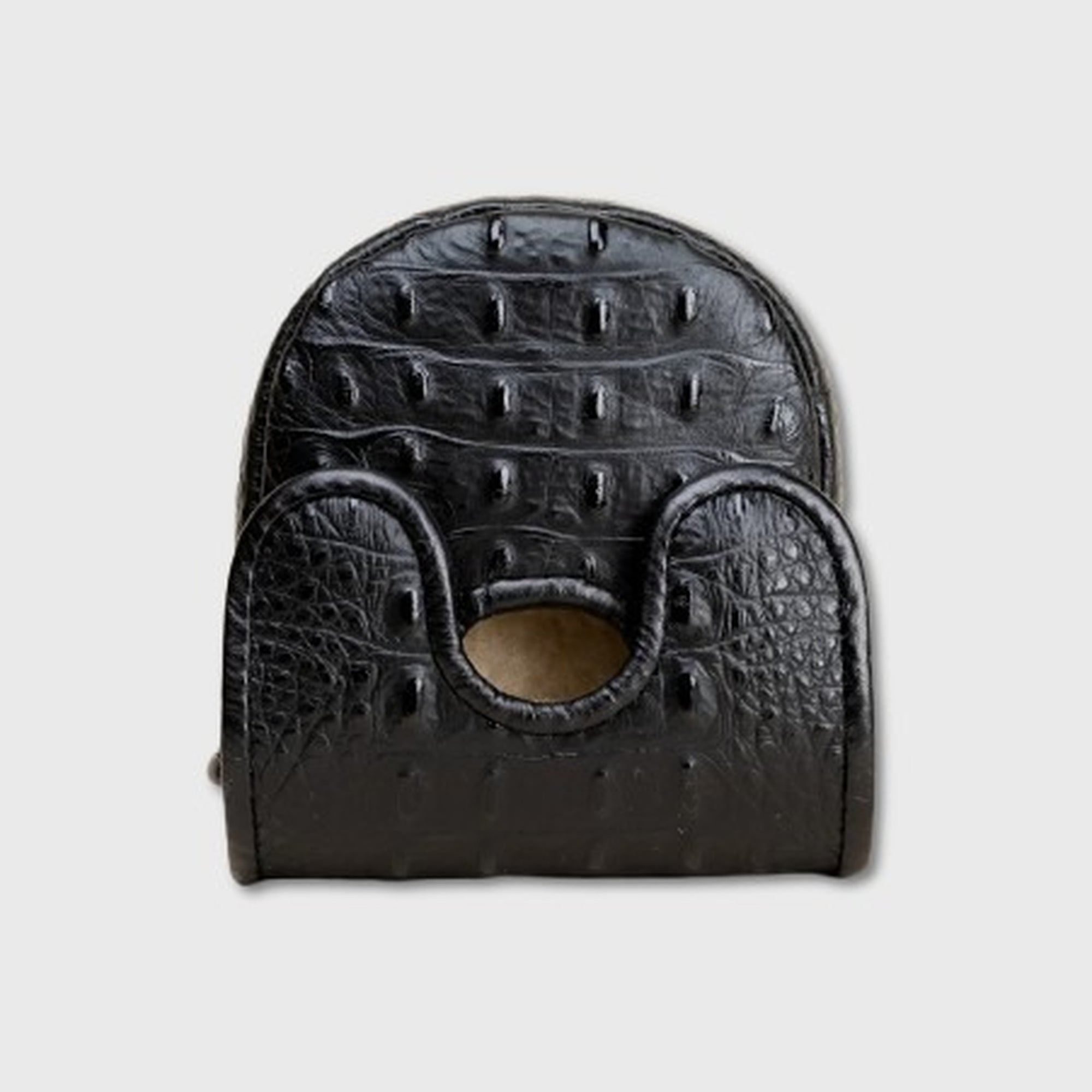 A black crocodile-embossed leather DF3 putter cover with a distinctive curved top and two front loops, shown against a light gray background.