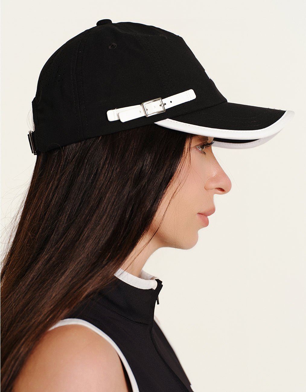Keypote Black Clip Golf Cap Brim Detail on Model | Erthe Golf