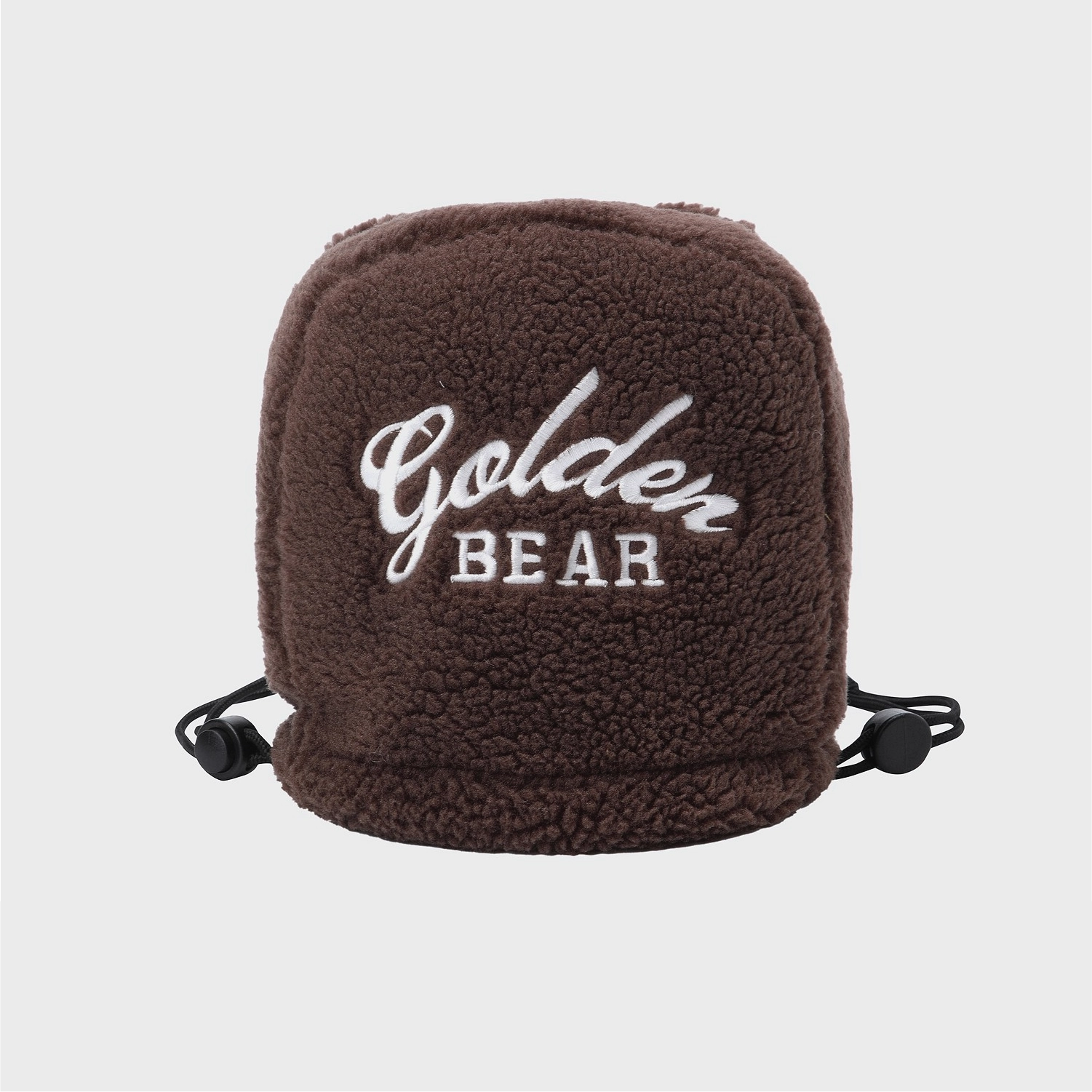 A brown sherpa fleece cap with 'Golden BEAR' embroidered on the front in white, featuring black drawstrings on the sides, set against a light gray background.
