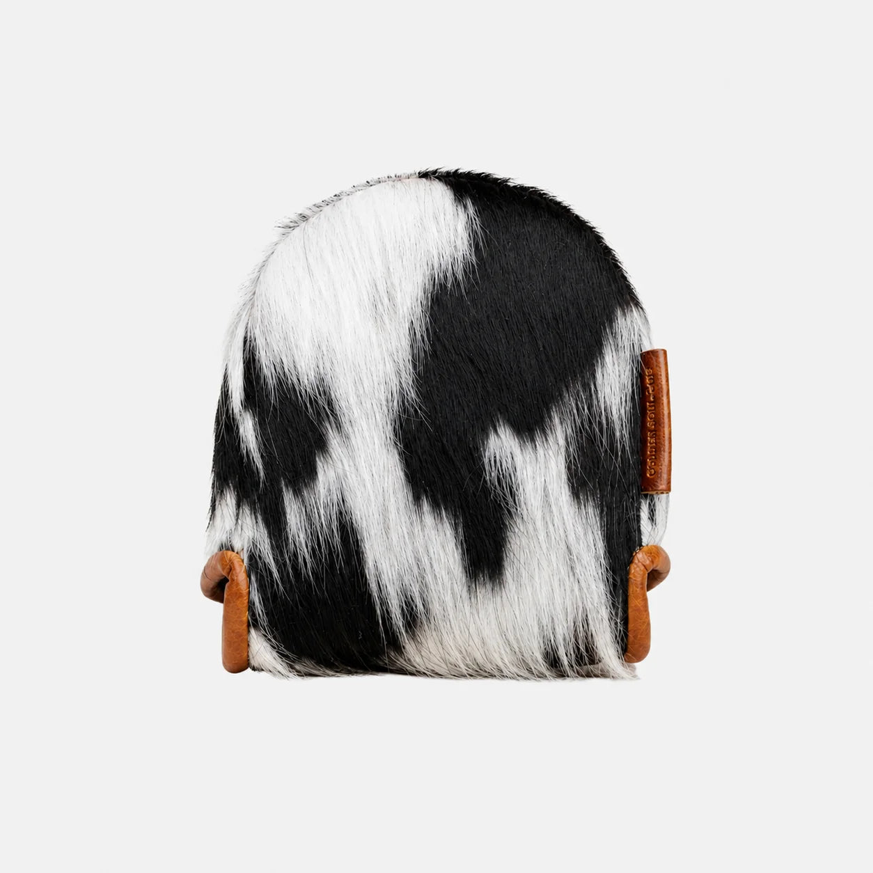 A Center DF3 Putter Cover made of black and white cowhide with brown leather strap accents, shown against a light gray background.