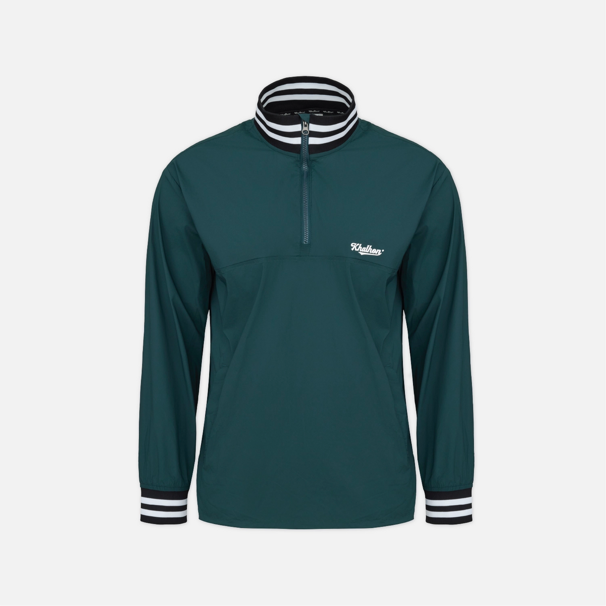 A dark teal long-sleeve quarter-zip pullover with a white embroidered 'Kellner' logo on the left chest, featuring a striped black and white collar and matching striped cuffs, shown on a light gray background.