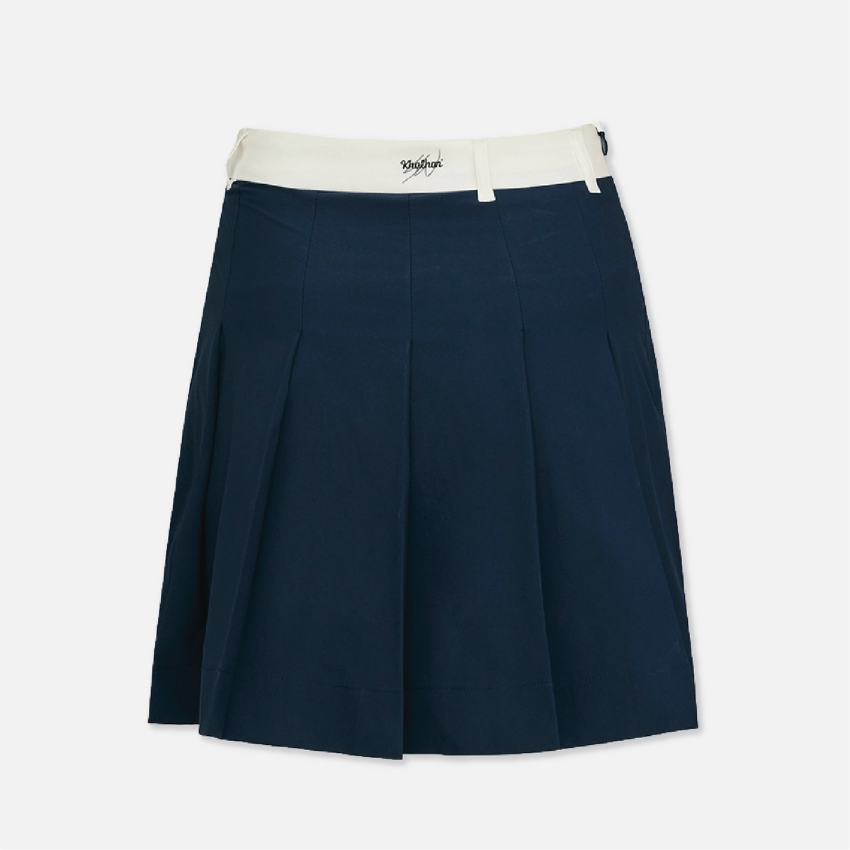 A navy blue pleated skirt with a contrasting cream waistband and a visible 'Khalhon' brand label at the center, shown against a plain light gray background.