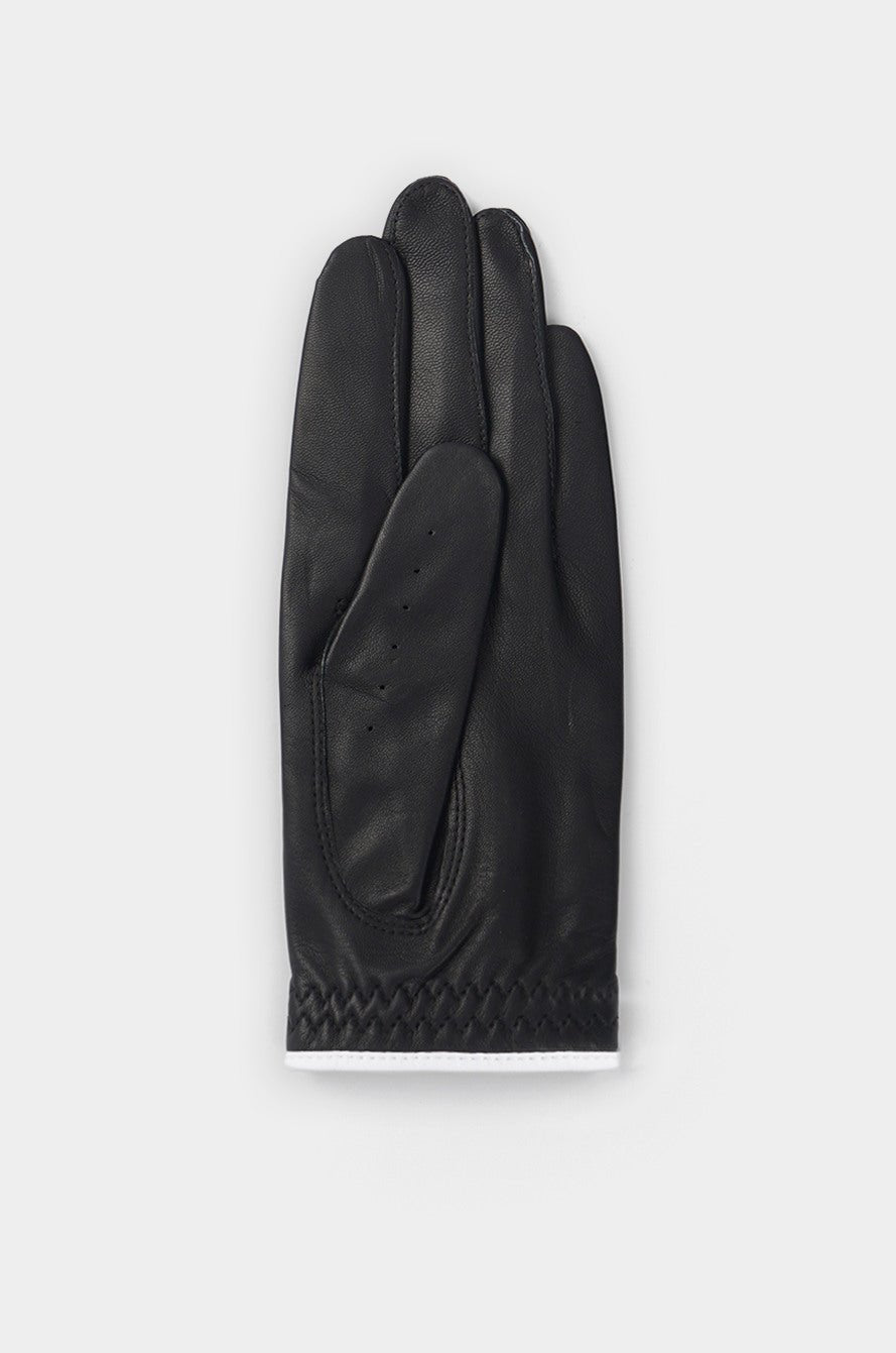 Black leather glove on a white background