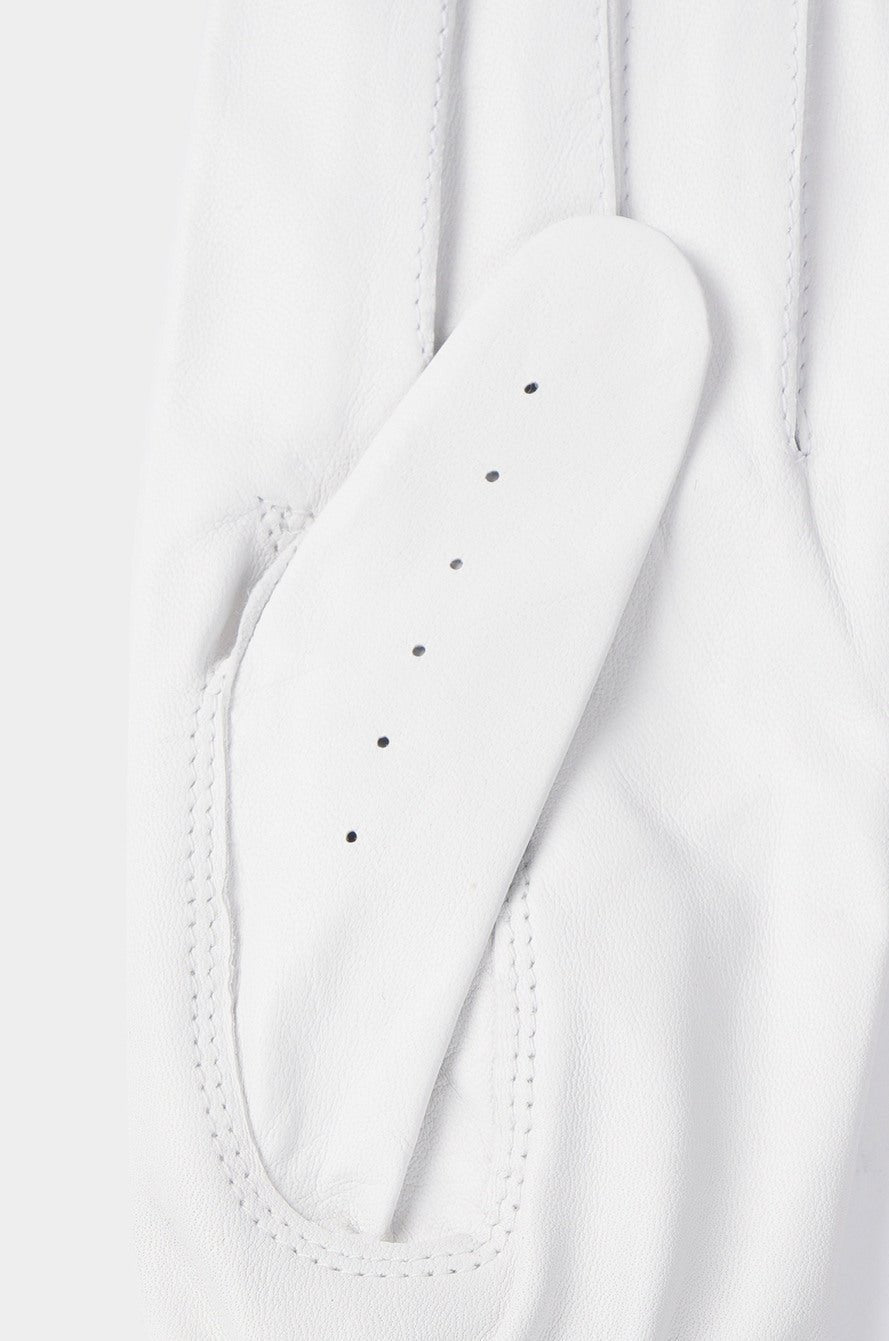 Close-up of a white golf glove on a white background