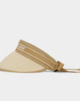 Beige visor with a white band on a light gray background