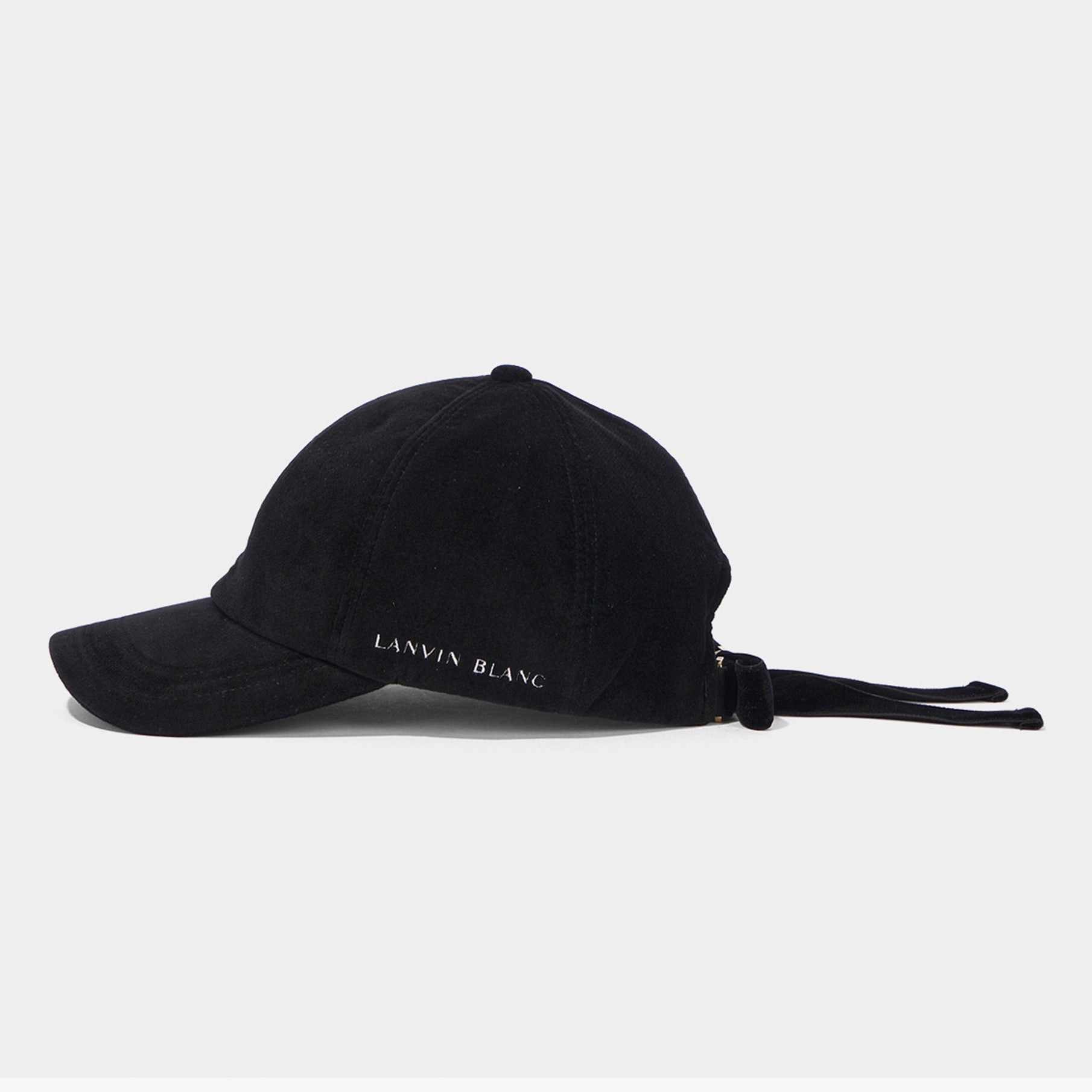 Black cap with 'LANVIN BLANC' logo on a light gray background