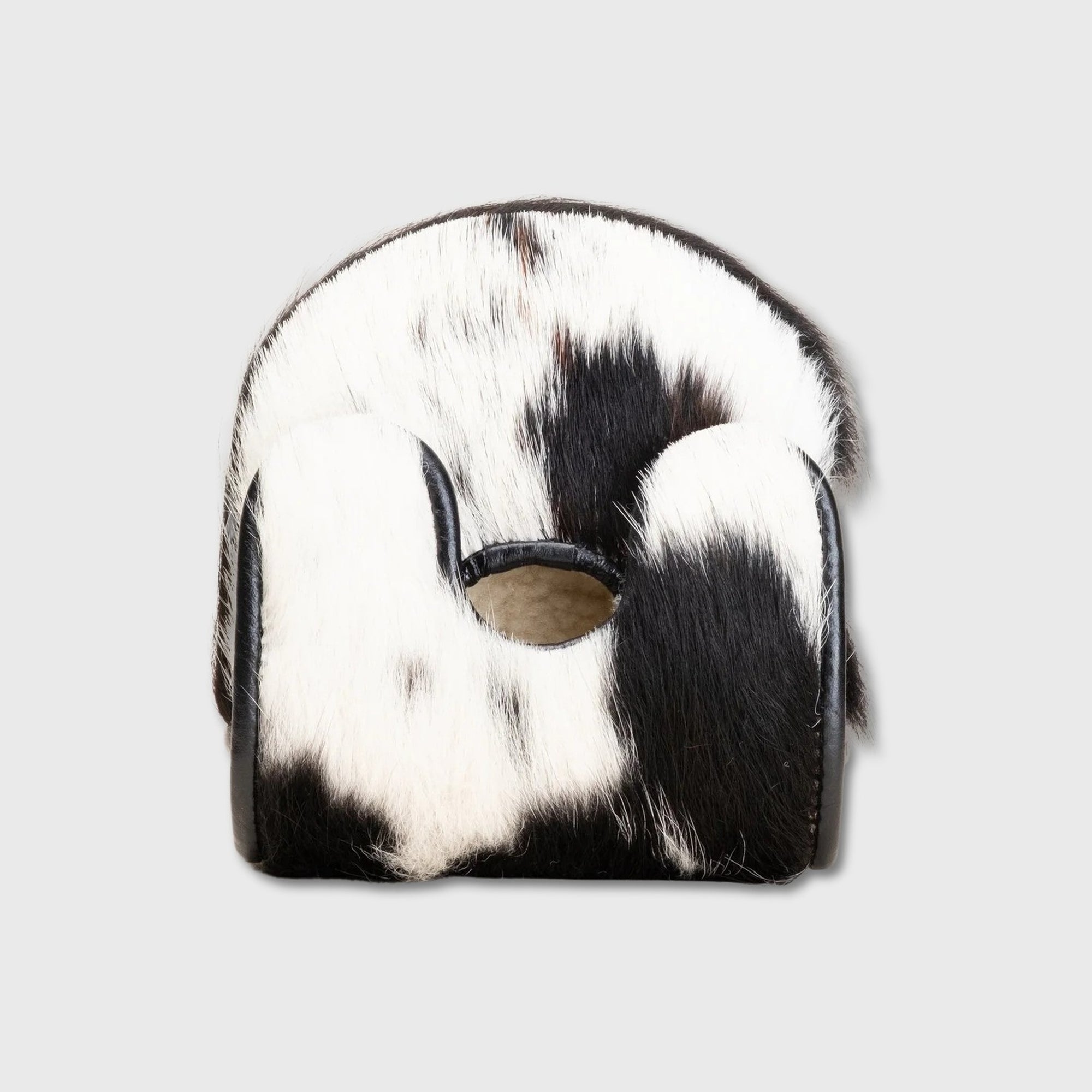 A small black and white cowhide Center DF3 Putter Cover, shown against a solid light gray background.