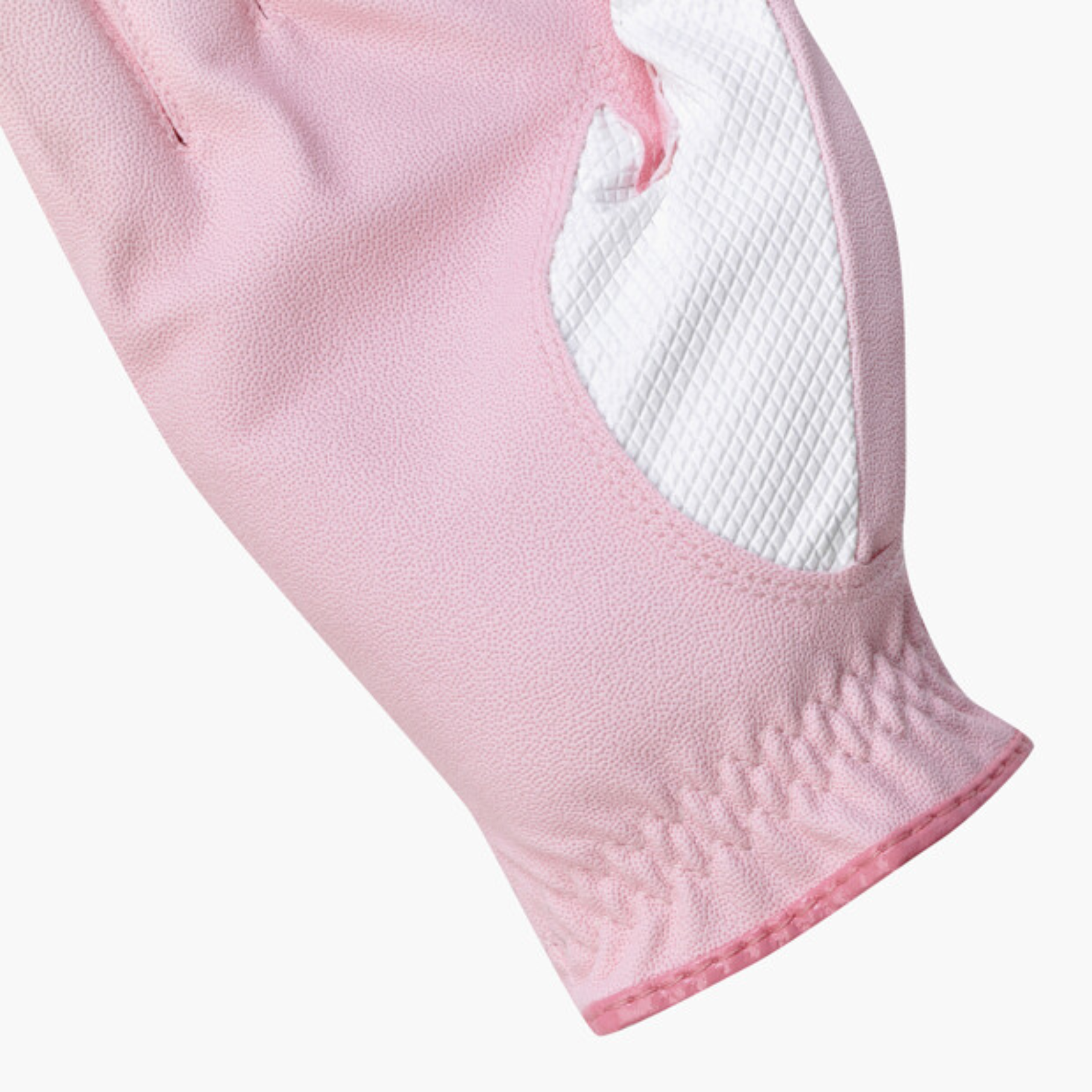 A close-up of a light pink glove with a white textured grip panel on the back, set against a plain light gray background.