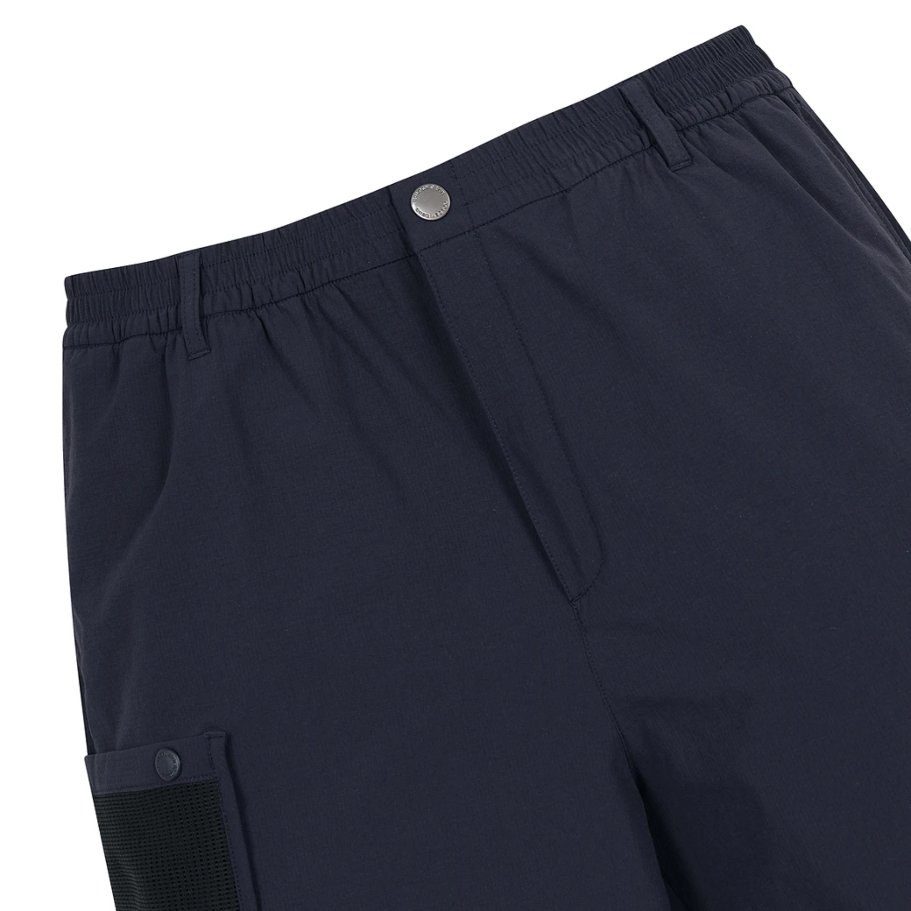 Close-up of dark navy blue athletic shorts showing the elastic waistband with a silver button, side pocket, and a mesh panel pocket on the leg.