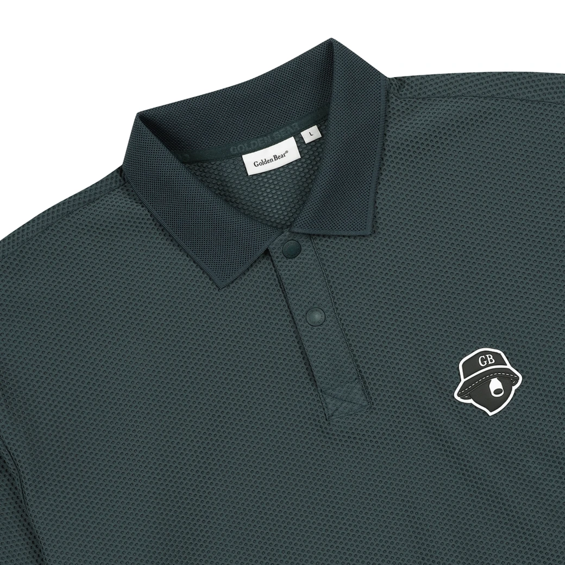 A close-up of a dark green textured polo shirt by Golden Bear, featuring a white embroidered chest logo and a visible brand label inside the collar.