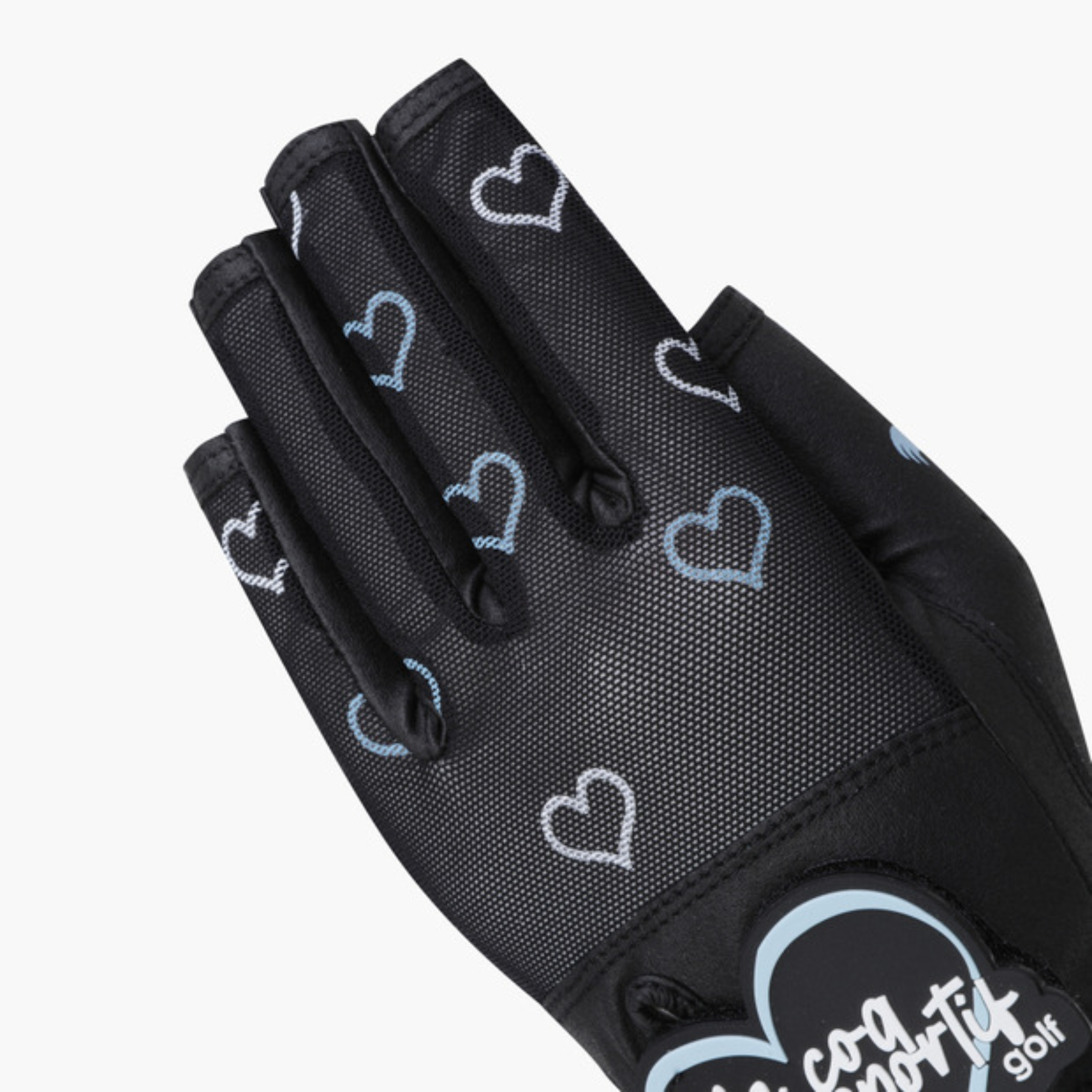 A close-up of a black fingerless golf glove with a pattern of light blue and white outlined hearts, featuring a visible 'cool touch golf' logo on the cuff.