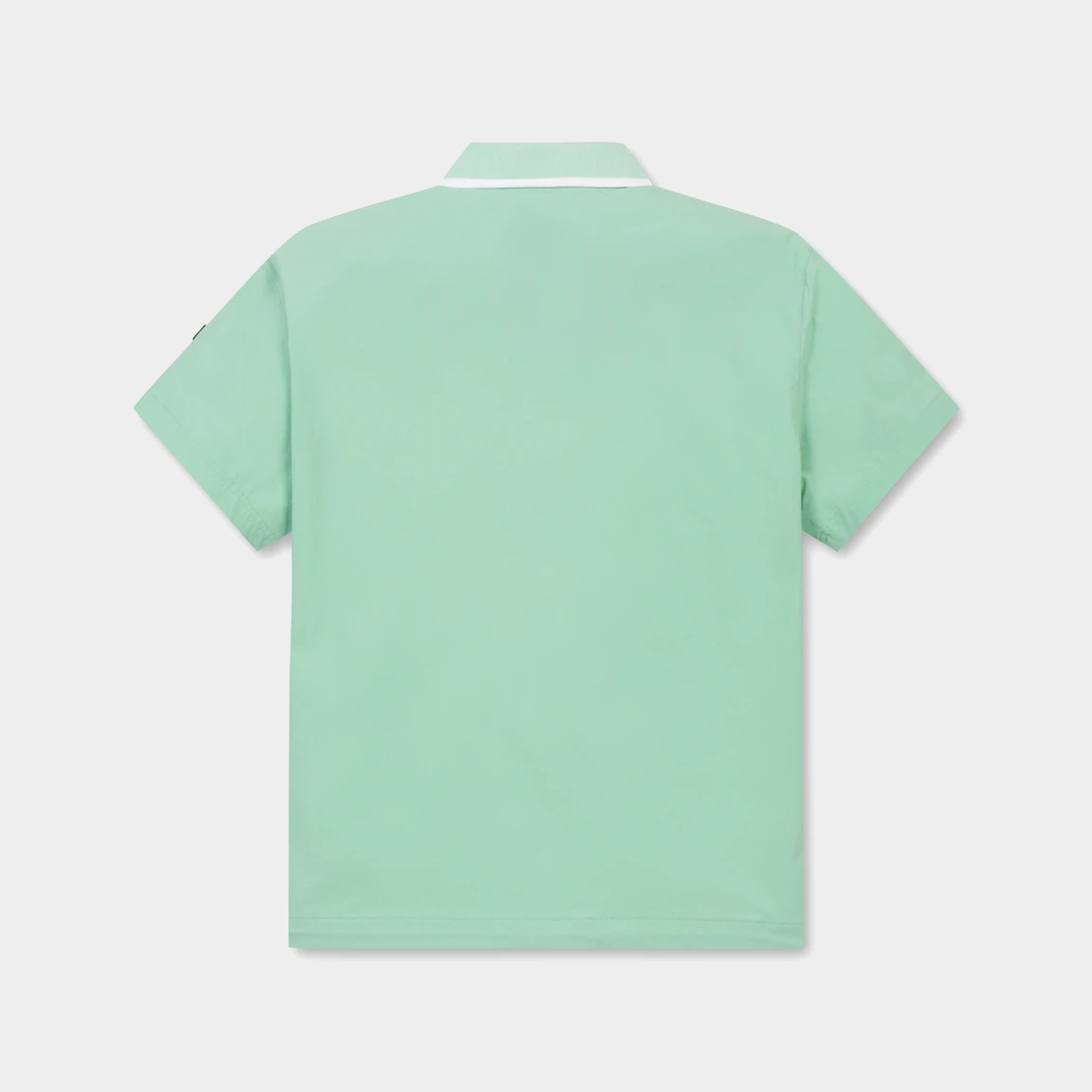 A mint green short-sleeve polo shirt shown from the back, featuring a white contrast collar, displayed on a clean light gray background.