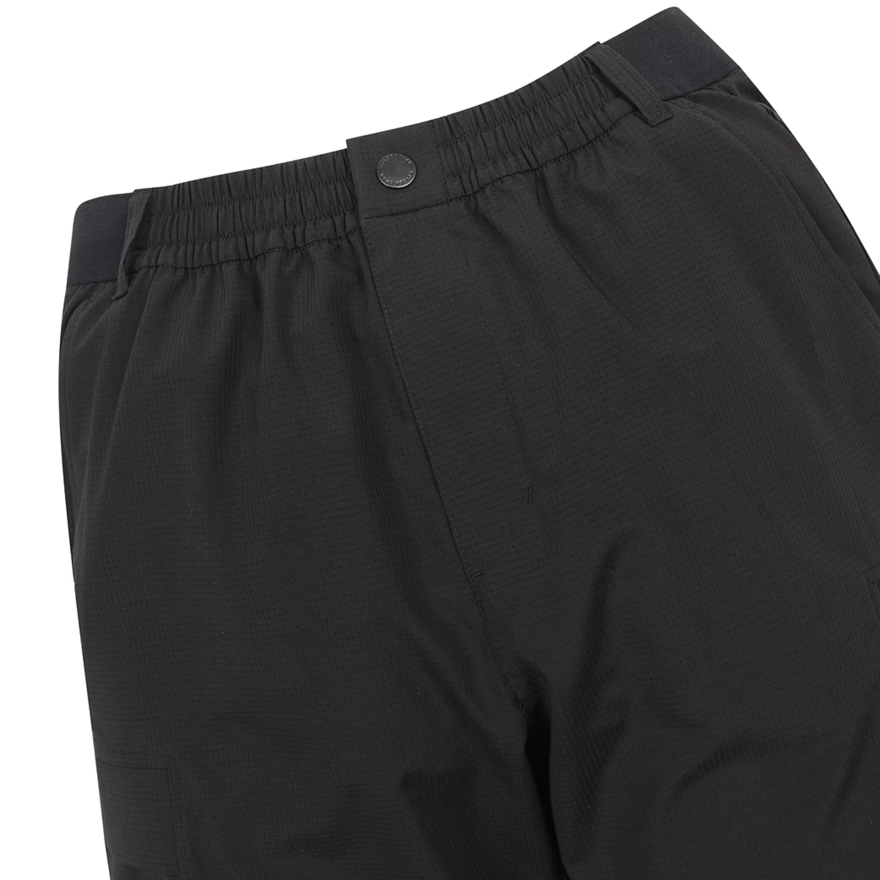 Close-up of black athletic pants showing the elastic waistband with a snap button closure and side pocket detail, photographed against a white background.