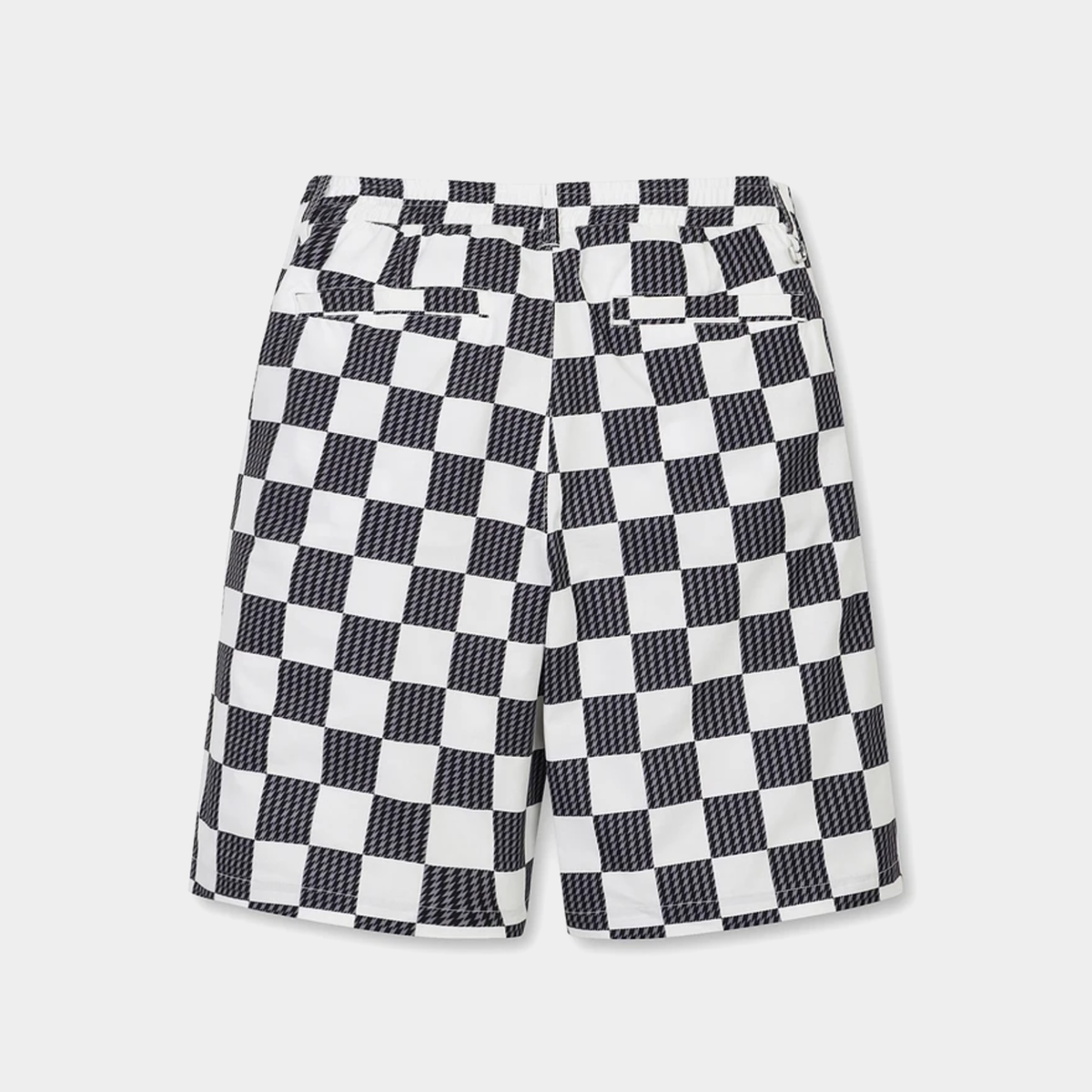 Black and white checkered shorts with a textured pattern, featuring a waistband and side pockets, shown against a light gray background.