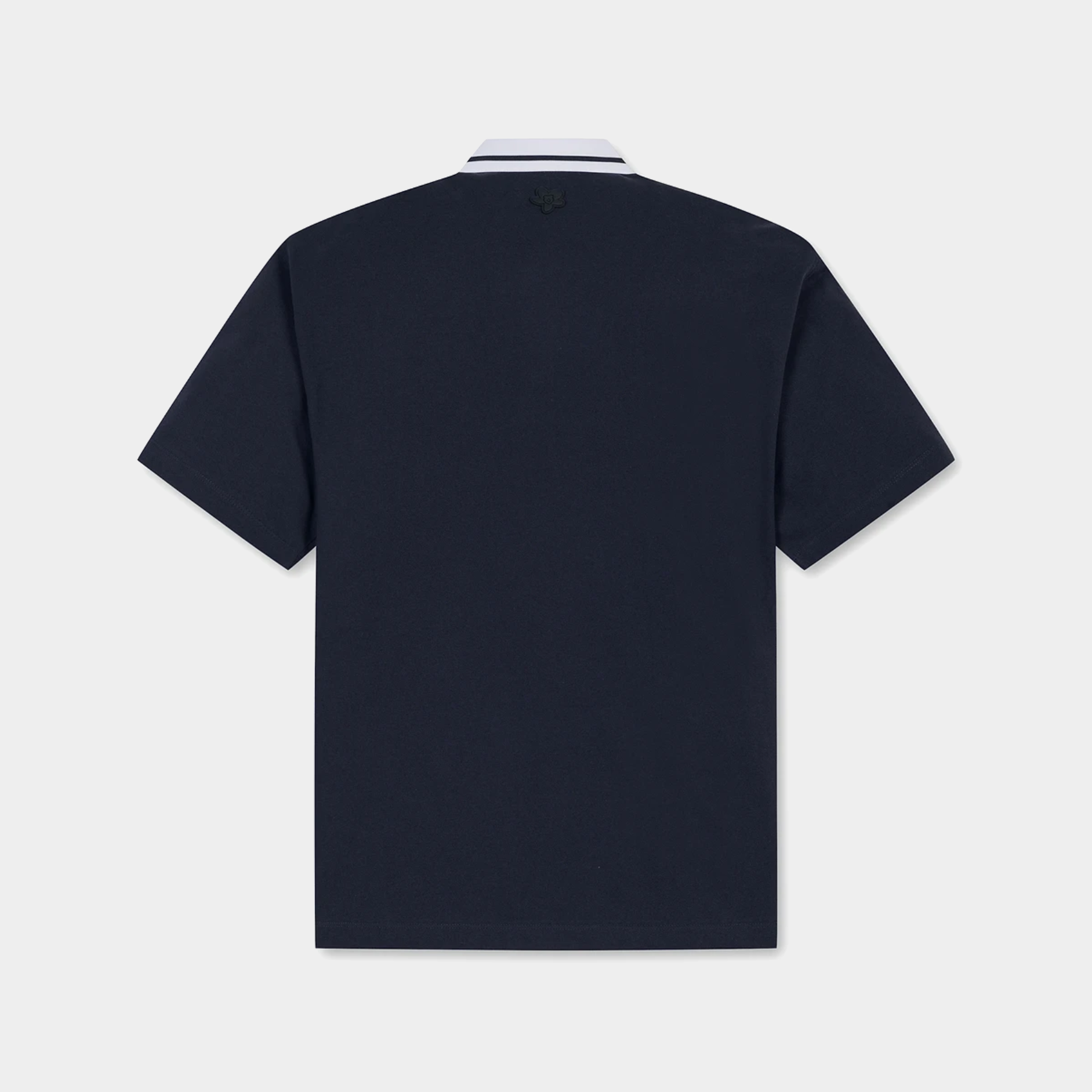 A dark navy blue short-sleeve polo shirt shown from the back, featuring a white and navy striped collar, on a light gray background.
