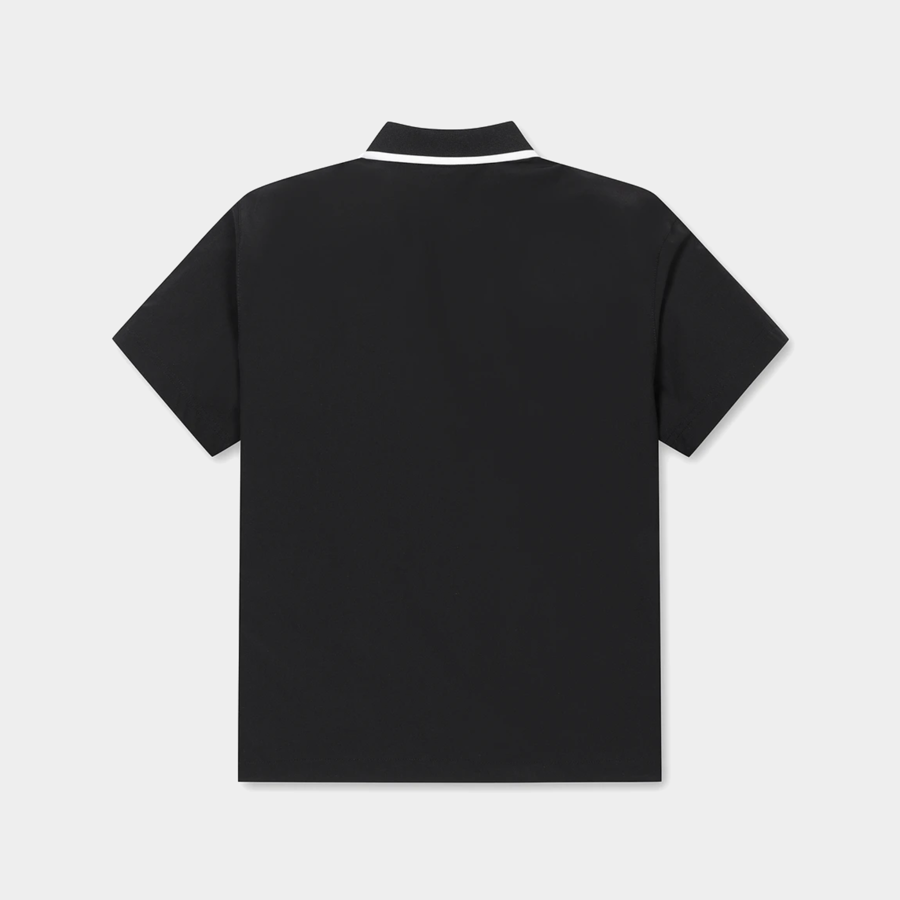 A black short-sleeve polo shirt shown from the back, featuring a white contrast stripe along the collar, set against a light gray background.