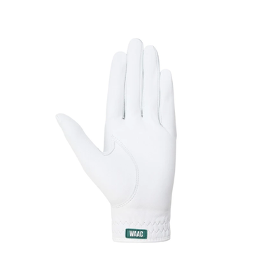 A single white golf glove shown flat against a solid white background, featuring a small green and white 'WAAC' patch on the cuff.