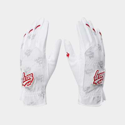 A pair of white Le Coq Golf golf gloves with red accents and a subtle gray camo pattern, displayed on a light gray background.