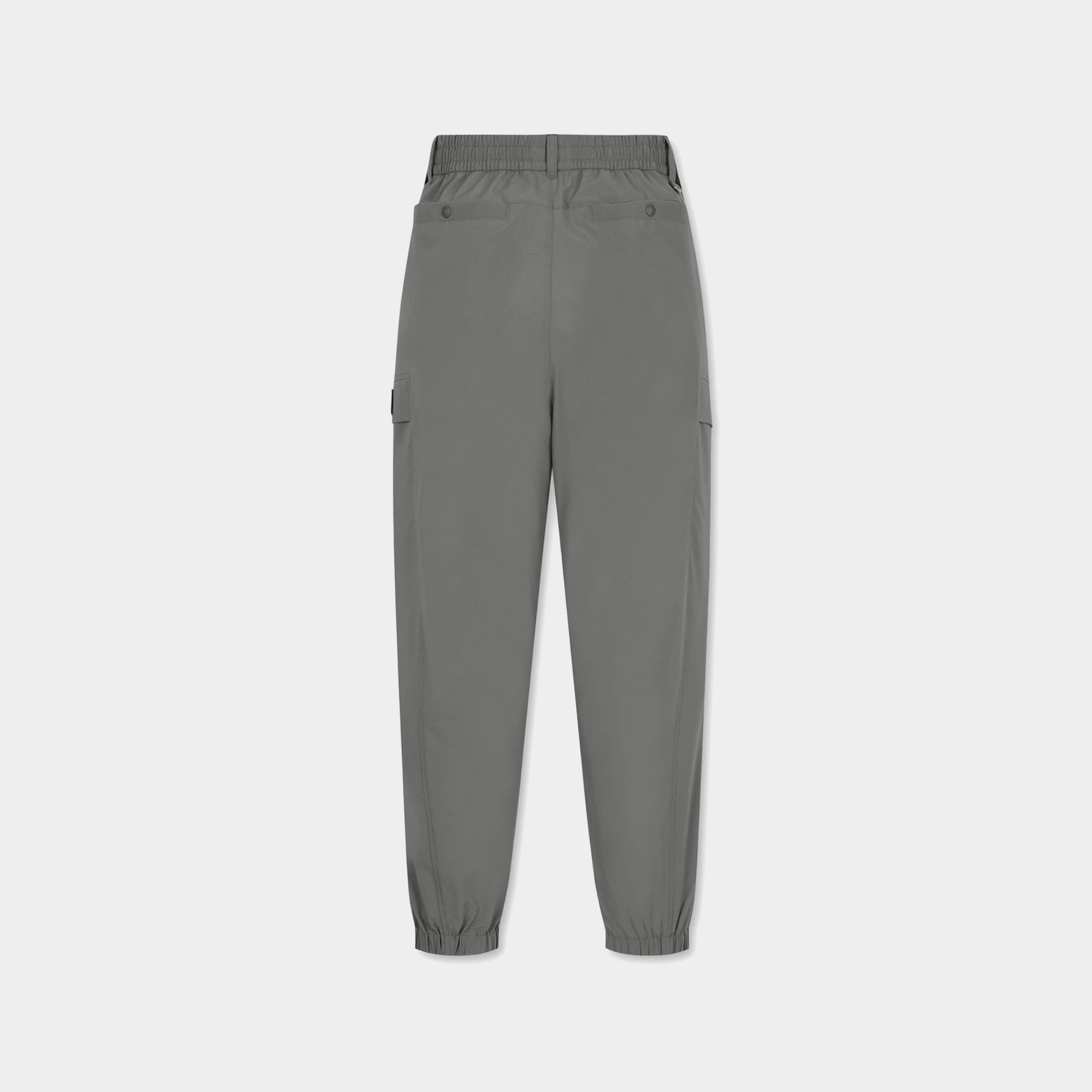 Back view of men's dark grey airdot cargo joggers with elastic waistband and cuffed ankles.