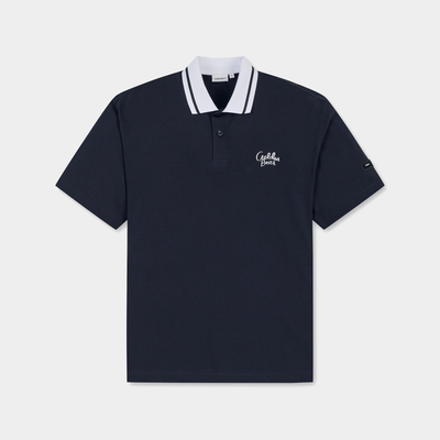 A navy blue short-sleeve polo shirt with a white and navy striped collar, featuring a white embroidered logo on the left chest and a small sleeve logo, displayed on a light gray background.