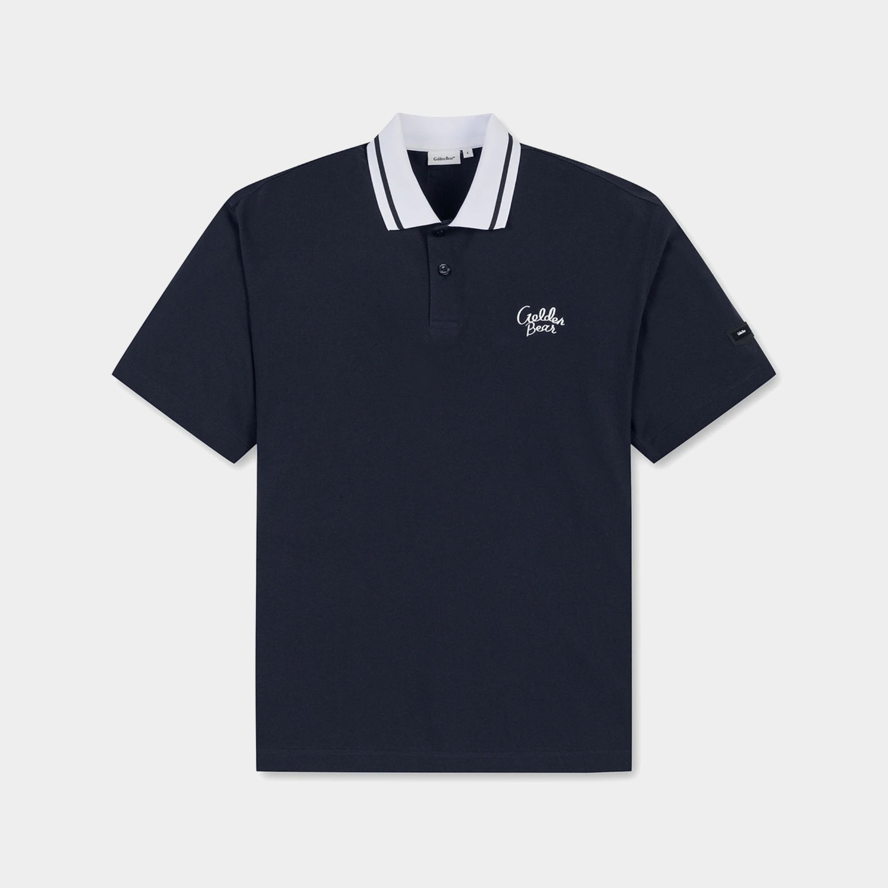 A navy blue short-sleeve polo shirt with a white and navy striped collar, featuring a white embroidered logo on the left chest and a small sleeve logo, displayed on a light gray background.