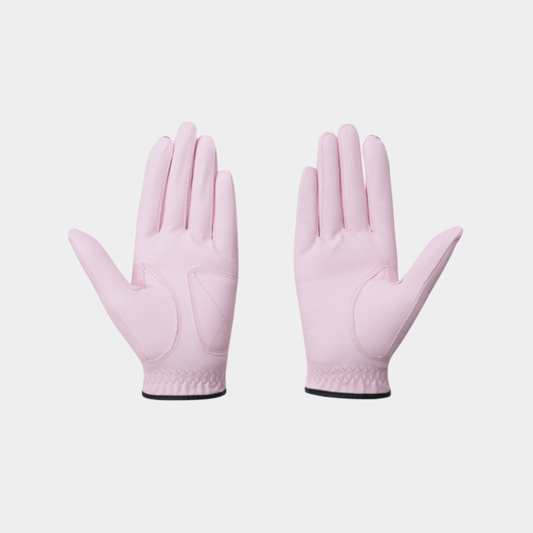 A pair of light pink riding gloves shown flat against a light gray background.