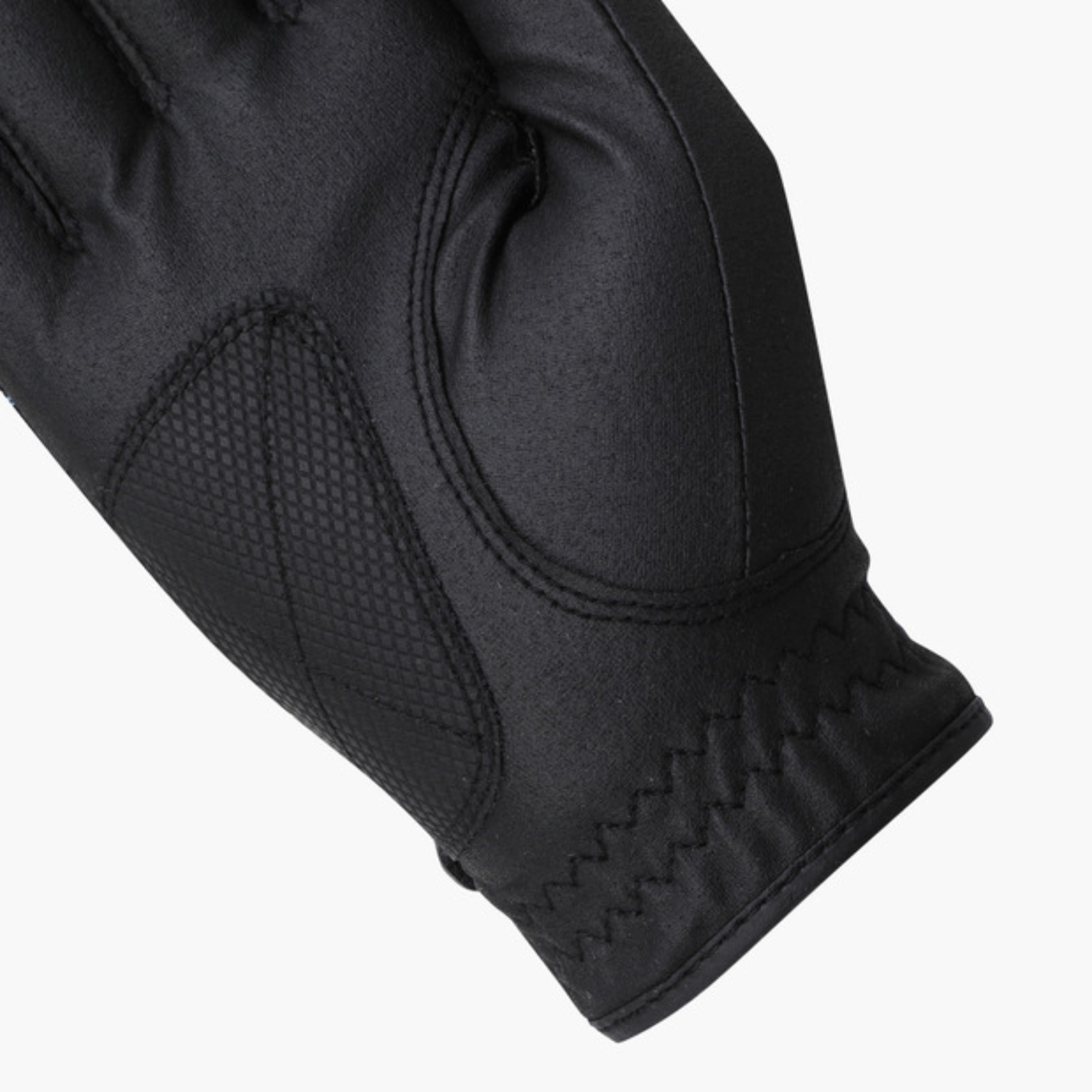 Close-up of a black insulated glove showing the textured knit fabric, stitched paneling, and elasticized cuff on a light gray background.