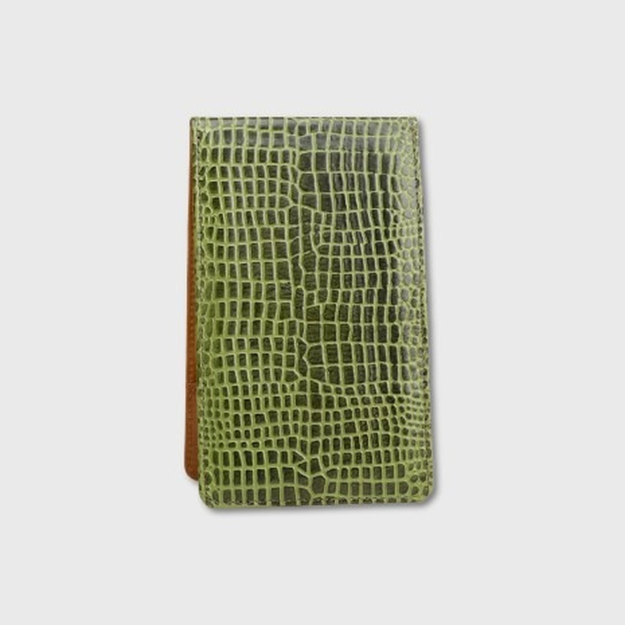 A slim, rectangular  yardage book holder featuring a textured green crocodile skin pattern, shown against a light gray background.