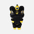 A black and yellow plush lion dance doll with embroidered details, photographed against a solid light gray background.