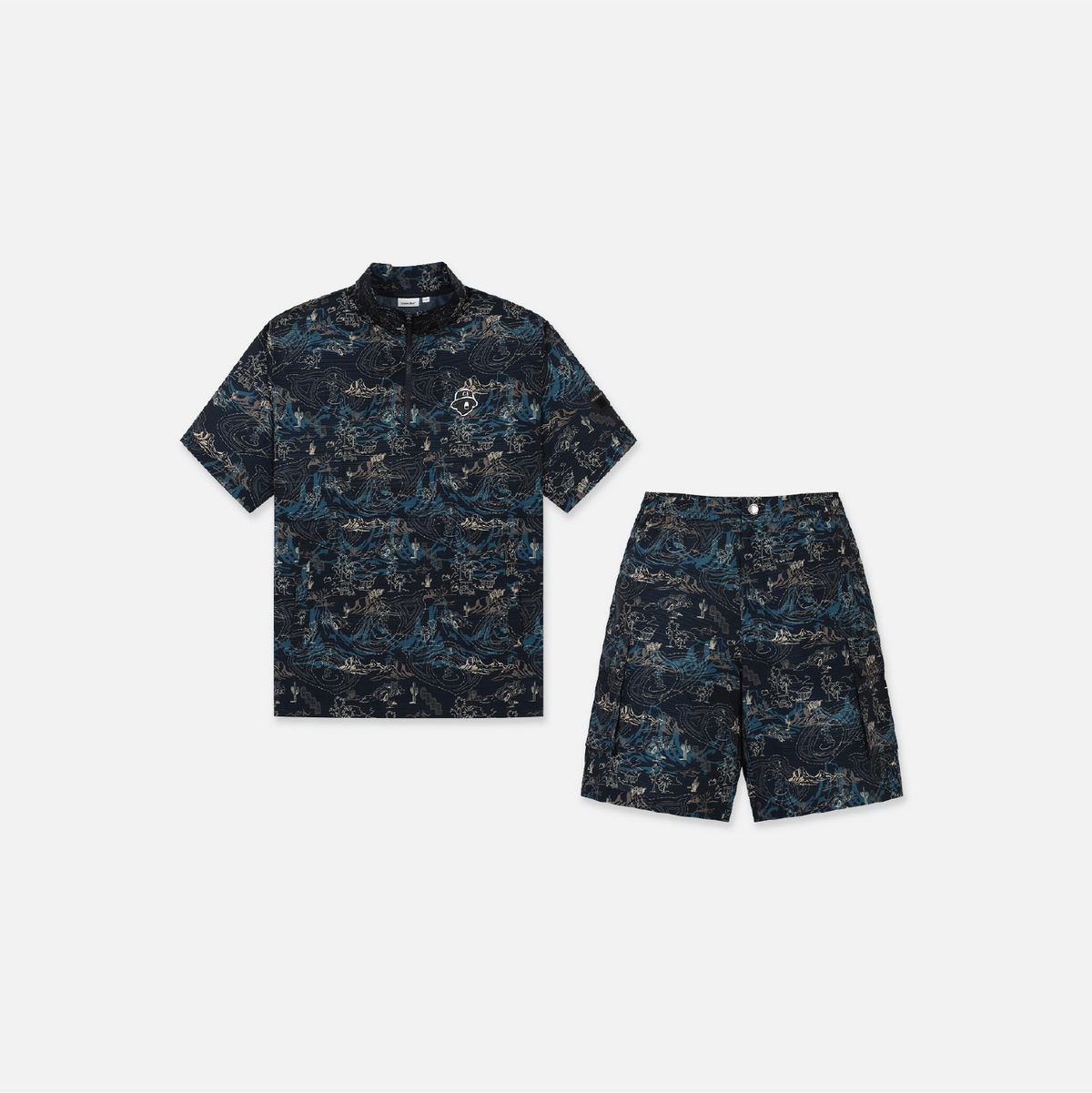 A matching two-piece set featuring a short-sleeve collared polo shirt and shorts, both in a dark navy blue and teal abstract wave-like pattern, displayed on a light gray background.
