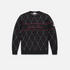 A black crewneck sweater featuring a white and red argyle pattern, a horizontal red stripe across the chest with &