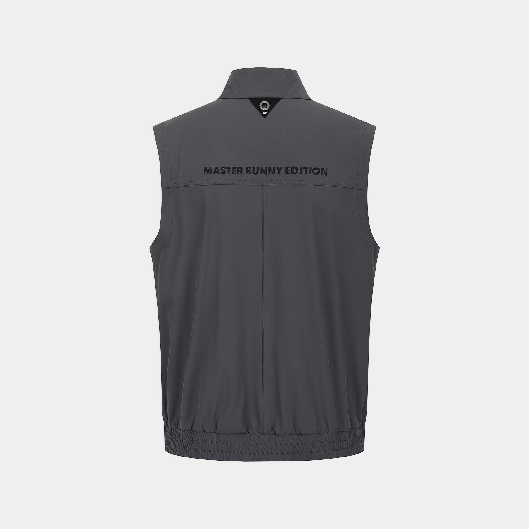 A dark gray sleeveless zip-up vest shown from the back, featuring the text 'MASTER BUNNY EDITION' printed in black across the upper back, set against a light gray background.