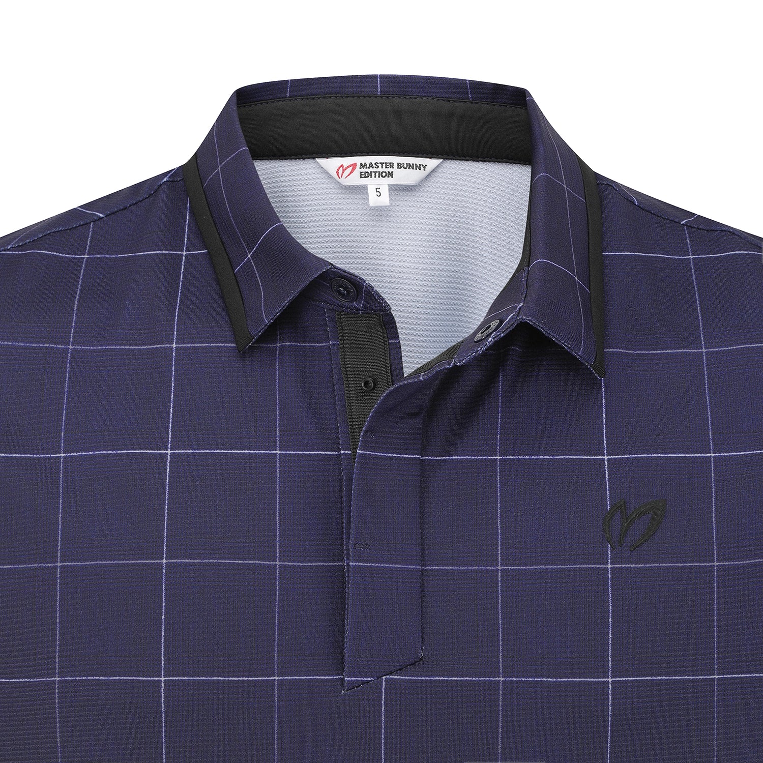 Close-up of a navy blue polo shirt with a subtle grid pattern, featuring a black collar and placket trim, and a small black embroidered logo on the chest.