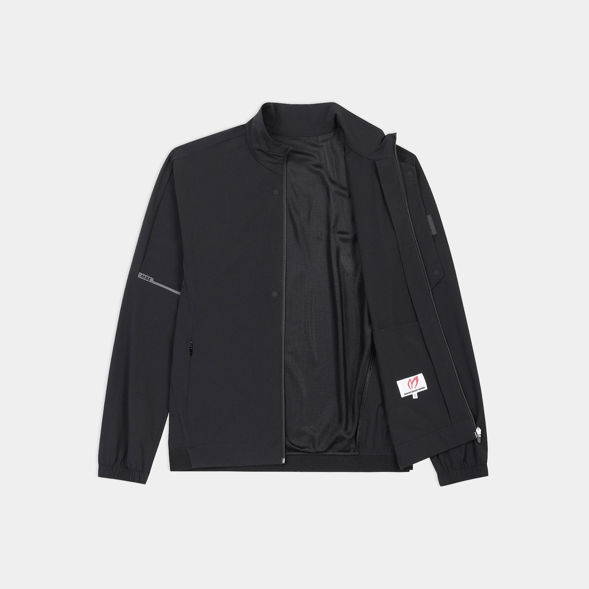A black lightweight zip-up jacket with a stand collar, laid flat against a light gray background. The jacket features a black interior lining, a zippered sleeve pocket, and a small white brand patch on the left sleeve.