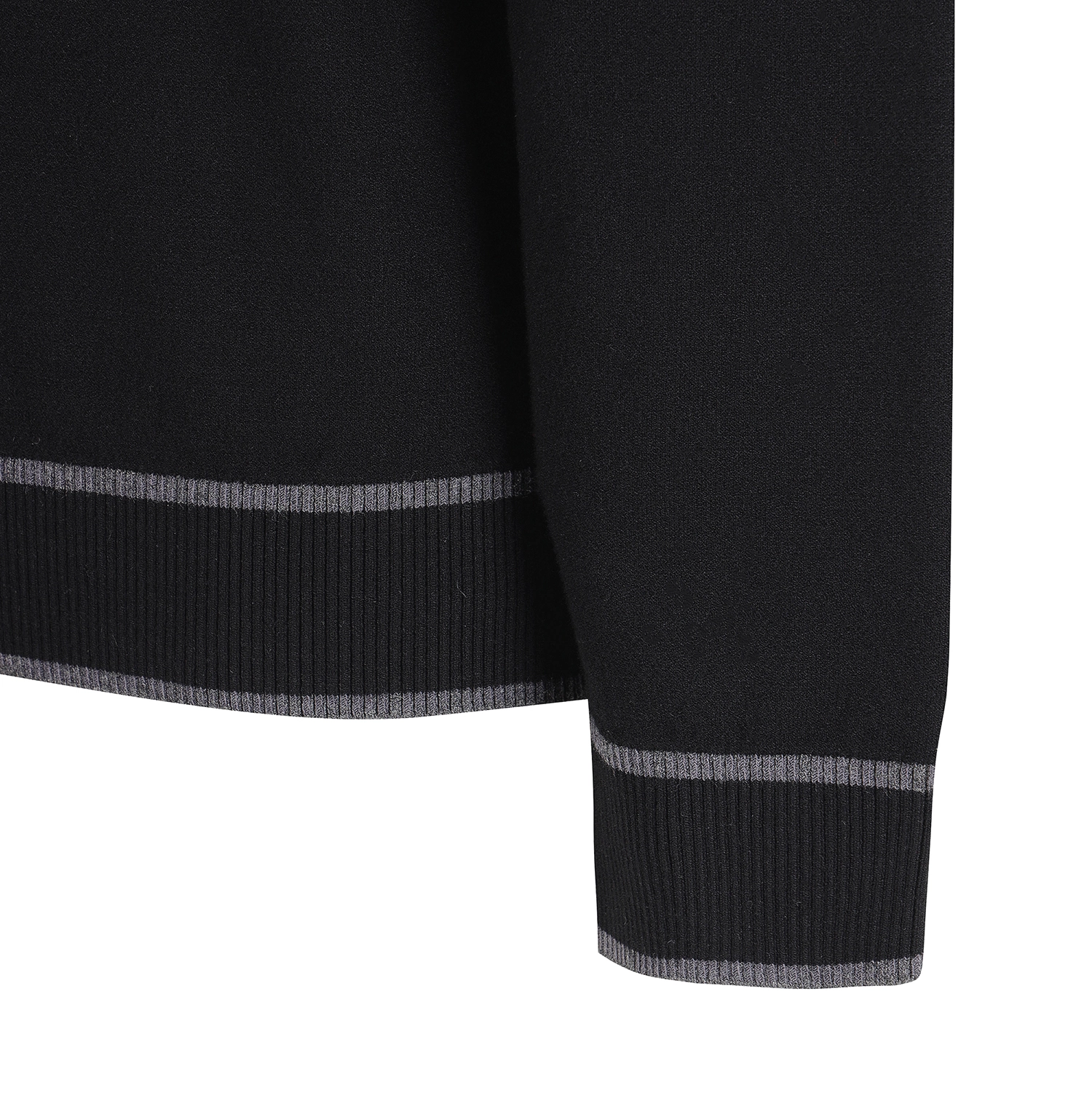 Close-up of a black knit garment with ribbed cuffs and hem, featuring thin gray stripe accents, shown against a plain white background.