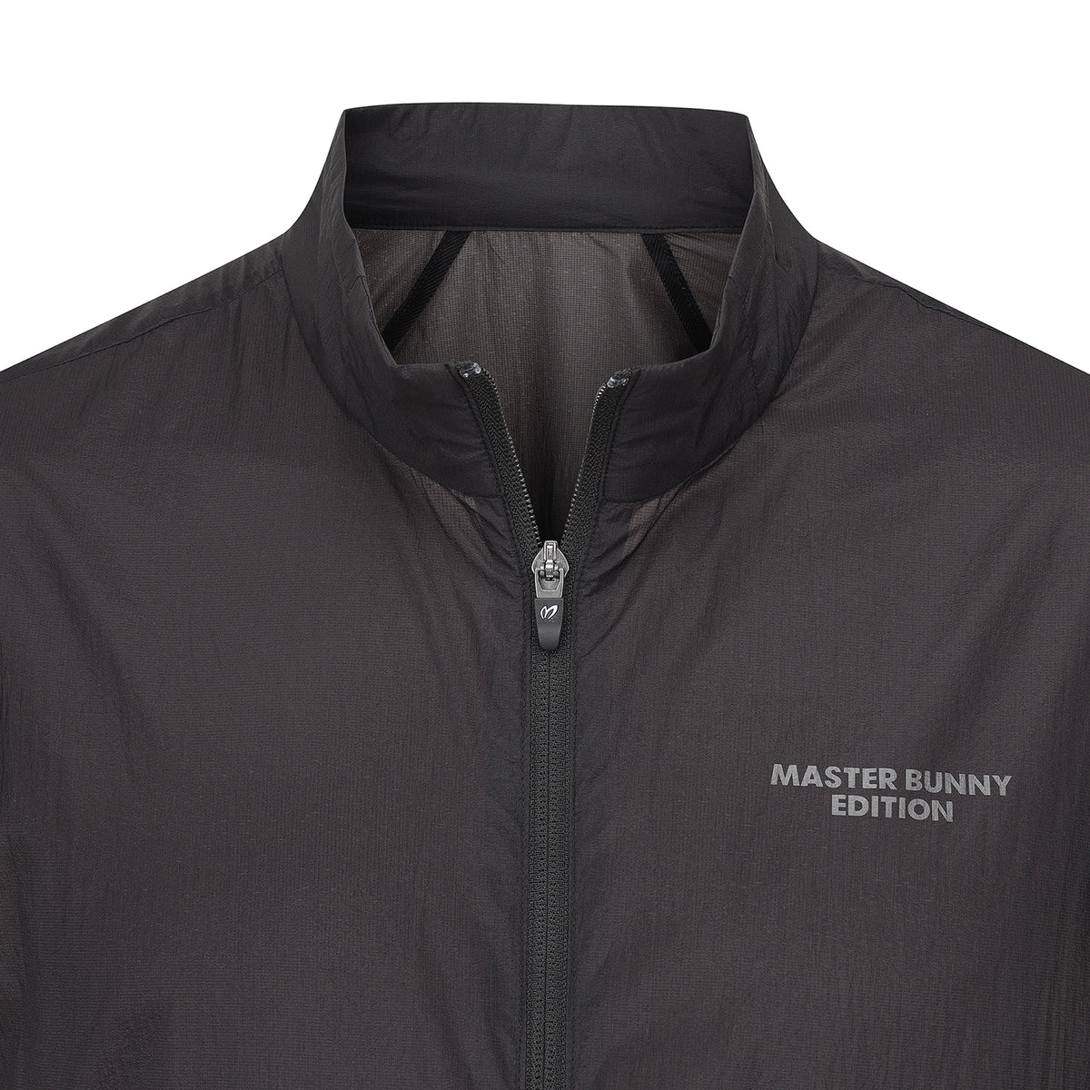 Close-up of a dark gray lightweight jacket with a stand-up collar, front zipper, and 'MASTER BUNNY EDITION' text on the chest.